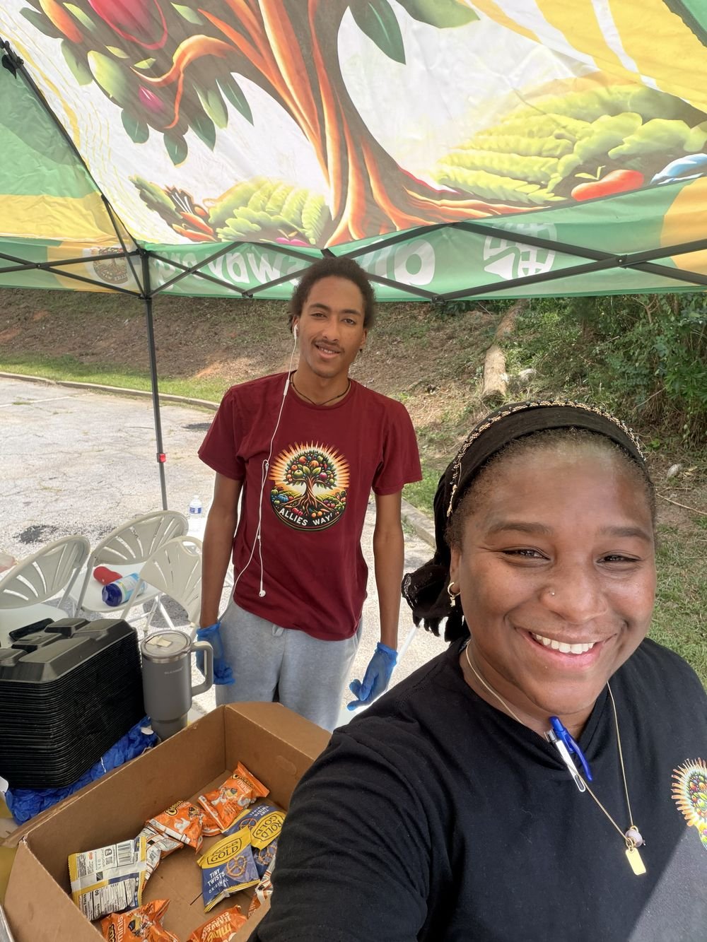 Allies Way volunteers at a lunch table with snacks